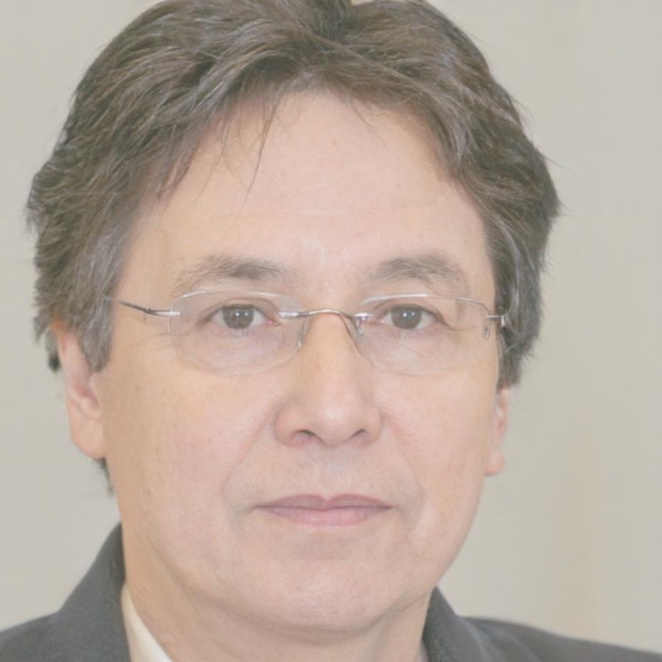 Financial education specialist Marcus Chen reviewing student portfolios