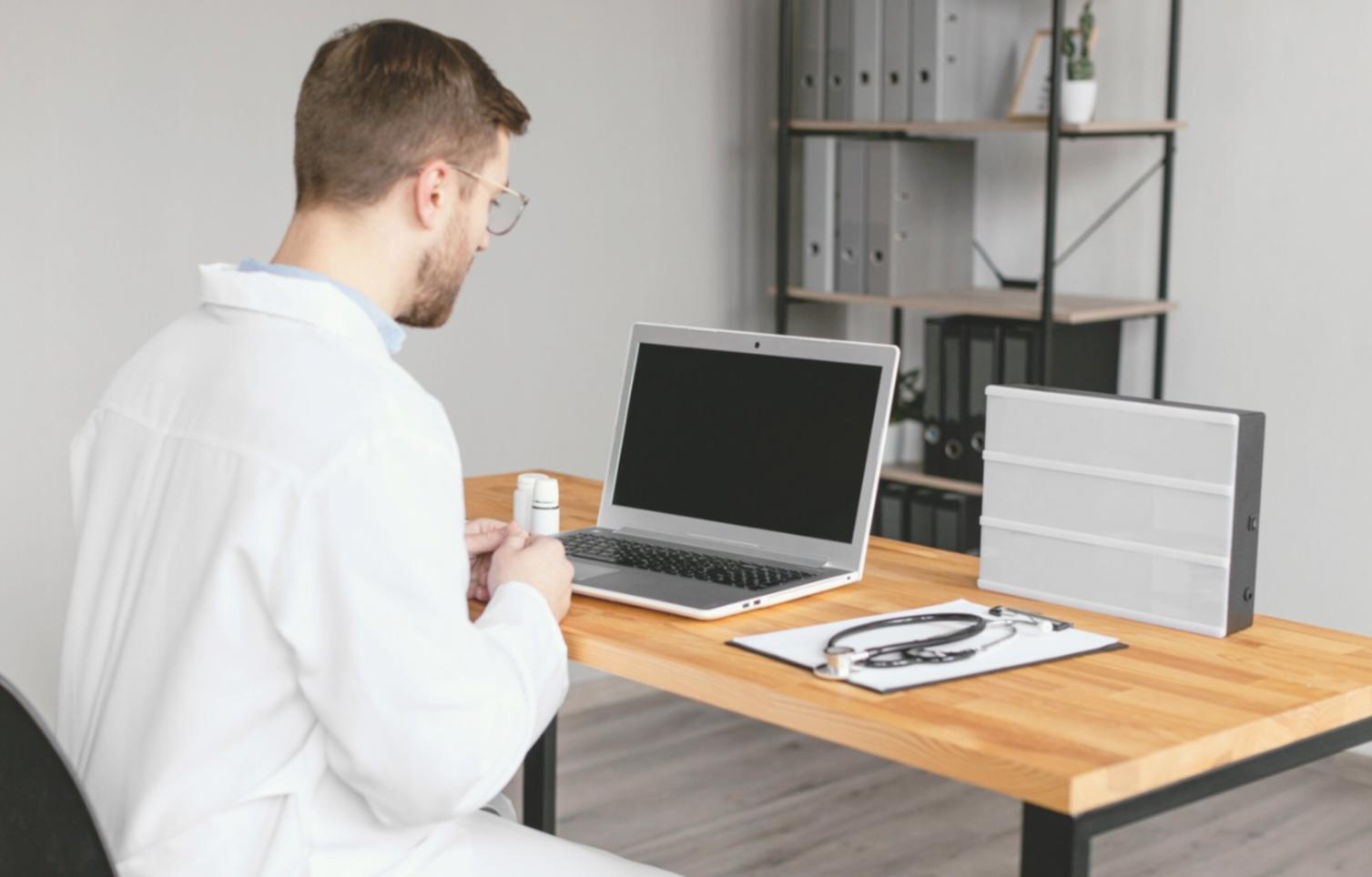 Close-up view of financial planning materials including budget worksheets and calculation tools