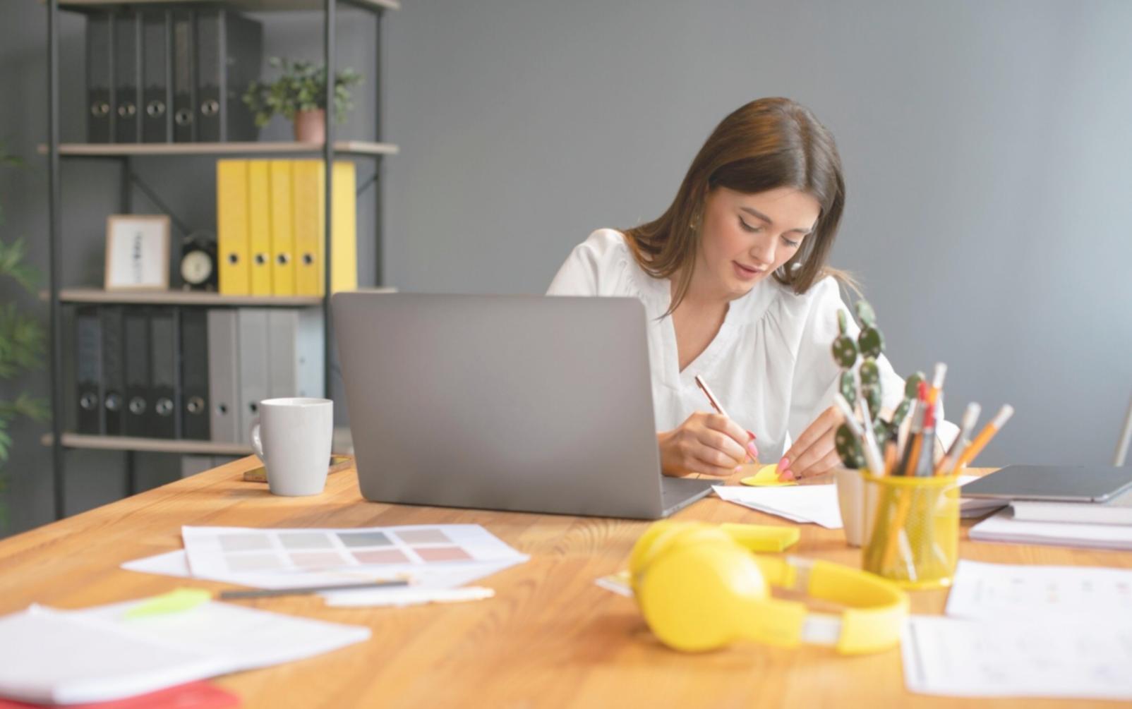 Modern office workspace with financial documents and planning materials