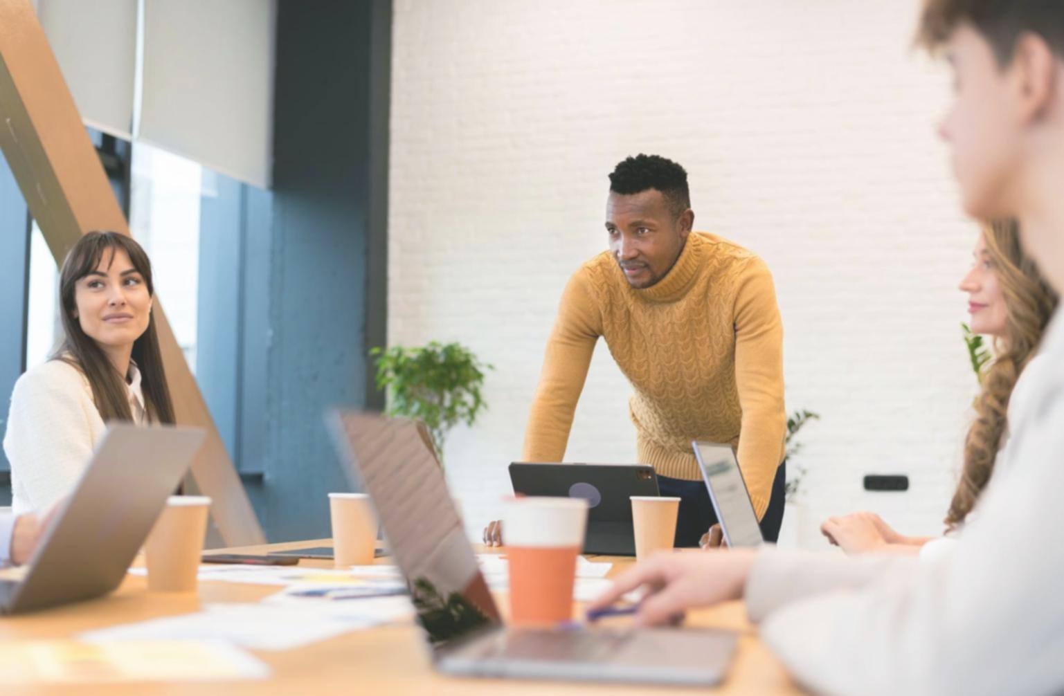 Students collaborating on financial planning exercises in modern learning environment