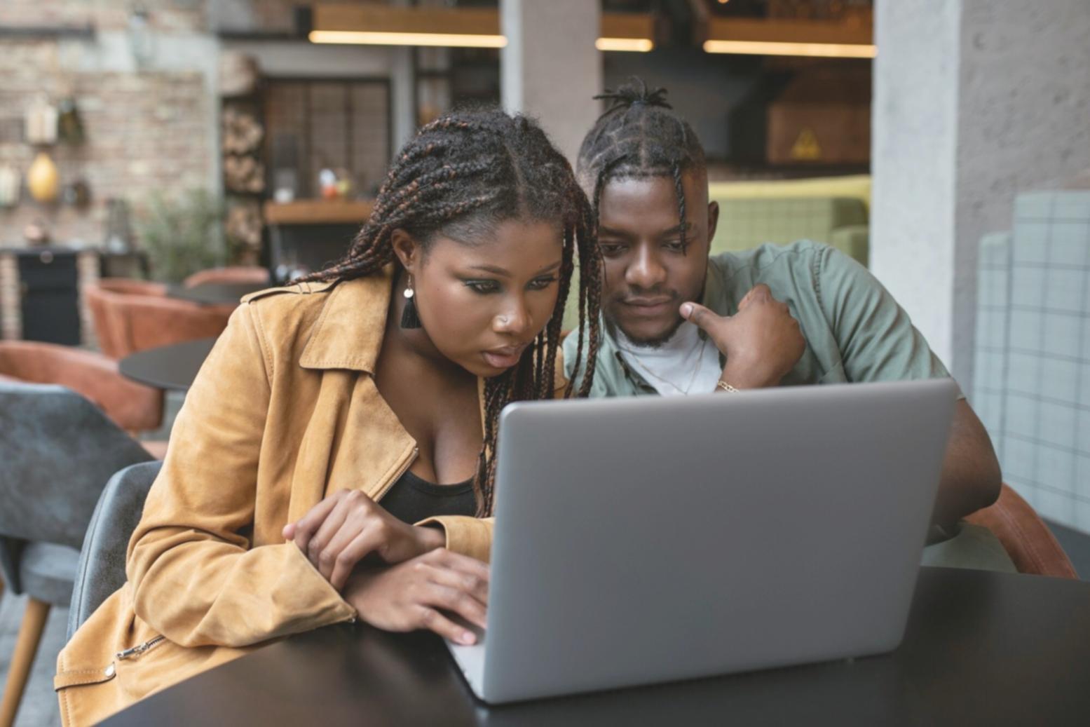 Interactive learning session with participants working on financial problem-solving exercises